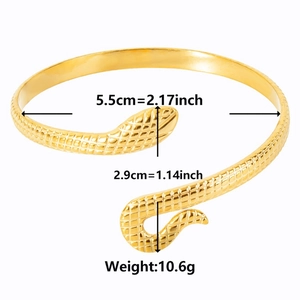 Detailed view of snake-shaped cuff bracelet with scale texture and size dimensions