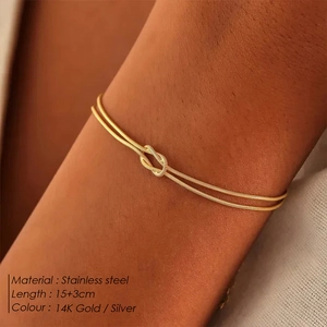 Detail view of gold knotted snake chain bracelet with 15+3cm adjustable extension link