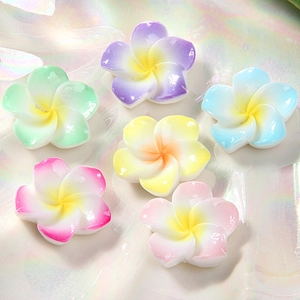 Colorful resin plumeria flowers in six vibrant shades for DIY hair clips and accessories
