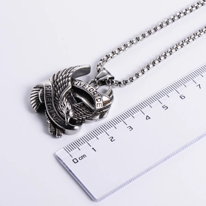 Punk eagle motorcycle pendant with Live to Ride engraving shown with scale on white background