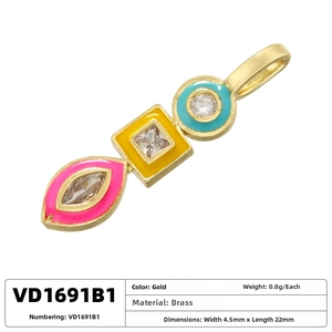 Detailed macro view of geometric brass pendant with colorful enamel and zircon inlay