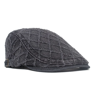 Vintage dark gray quilted denim flat cap with diamond stitch and metal buckle detail