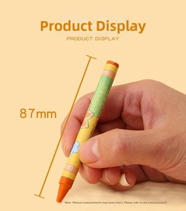 Close-up of 87mm long orange cartoon crayon with ergonomic paper wrap for children