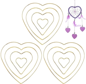 Macro detail of gold metal heart-shaped rings for DIY dream catchers and crafts
