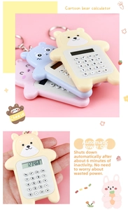 Handheld view of mini cartoon animal calculators in bear, cat, and pig designs