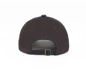 Detail view of cotton baseball cap back with adjustable metal buckle and stitching
