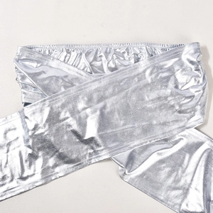 Detailed close-up of reflective silver metallic tube top with gathered elastic hem