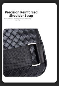 Detail of the reinforced shoulder strap and precision stitching on the black woven chest bag