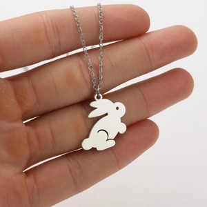Detail of a silver bunny pendant necklace made of high-quality polished stainless steel