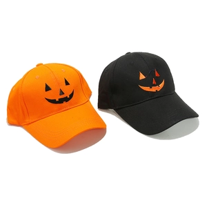 Halloween pumpkin embroidered baseball caps in bright orange and black colors