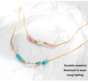 Detailed shot of 18K gold plated necklace with freshwater pearls and colorful beads