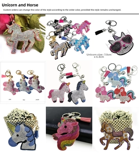 Detail of crystal rhinestone unicorn keychain with silk tassel and leather base