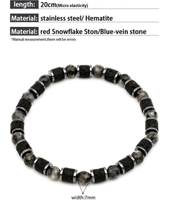 Detail of 7mm beaded bracelet with hematite and red snowflake stone on 20cm elastic cord