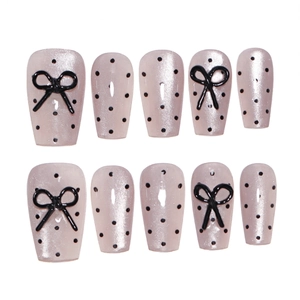 Pink cat eye press-on nails with black polka dots and 3D bowknot detail, 10pcs set