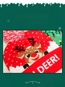 Detail of colorful glowing LED knitted hats with reindeer patterns for Christmas holiday