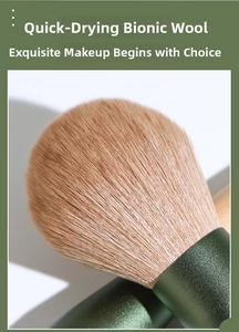 Macro detail of quick-dry bionic wool makeup brush bristles with matte green ferrule