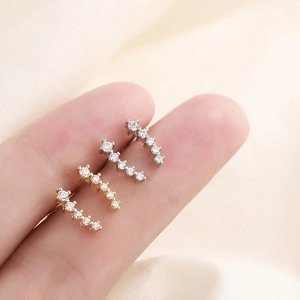 Minimalist bar stud earrings with sparkling cubic zirconia in silver and gold finishes