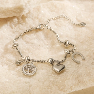 Silver tree of life charm bracelet with zirconia heart and horseshoe on stone