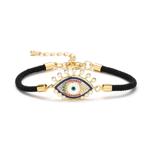 Bracelet ajustable en cordon noir avec œil protecteur doré et zircons multicolores