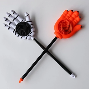 Halloween trick or treat candy grabber set with skeleton hand and pumpkin claw tools