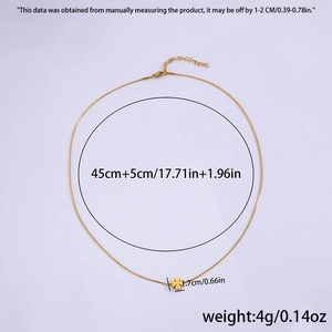 Detailed view of 18k gold titanium necklace with clover pendant and size measurements