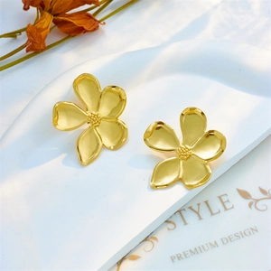 Elegant gold flower stud earrings with irregular petals and polished metallic finish