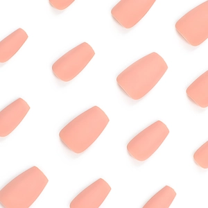 Matte peach solid color ballerina shape press-on nails set arranged on a white background