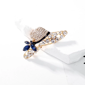 Sparkling crystal hat-shaped brooch with blue flowers on white decorative stones