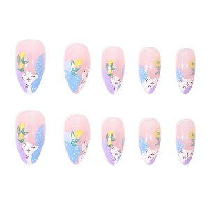 Almond-shaped press-on nails with hand-painted yellow lemons and colorful floral patterns