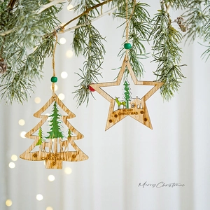 Christmas tree and star wood ornaments with laser-cut reindeer and Merry Christmas text