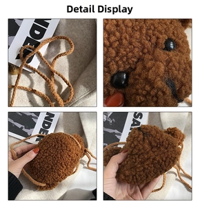Detail view of plush bear crossbody bag showing woven strap and soft fuzzy texture