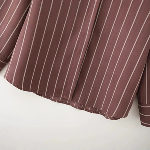 Coffee red striped long sleeve shirt featuring a curved hem and detailed sleeve cuffs