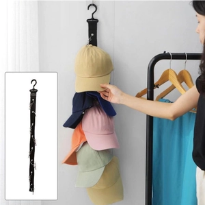 Vertical wall-mounted baseball cap organizer with heavy-duty metal clips on black nylon strap