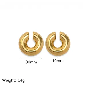Detail view of 30mm gold hollow C-shape earrings with polished vacuum plated finish