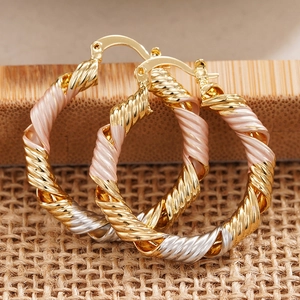 Three-tone twisted rope hoop earrings with gold, rose gold and silver spiral design