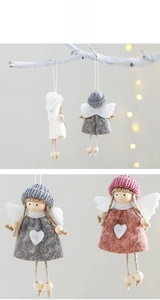 Detail of handmade knit angel ornaments with wooden beads and white felt wings
