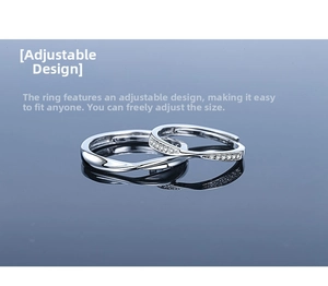 Close-up of Mobius silver couple rings with pavé diamonds and adjustable bands