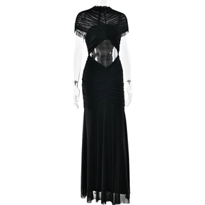 Detail of elegant black sleeveless evening gown with mesh stitching and waist cut-out