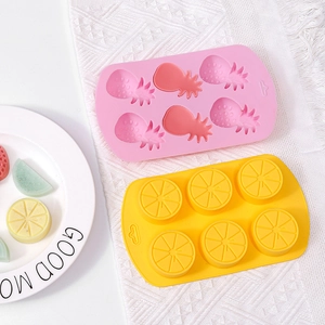 6-cavity fruit silicone mold set for baby food and soap featuring strawberry and lemon shapes