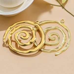Golden spiral vortex pendants in hammered and striped textures for DIY jewelry