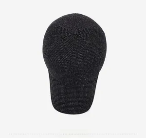 Top view of men's winter wool baseball cap showing premium knitted texture and metal logo