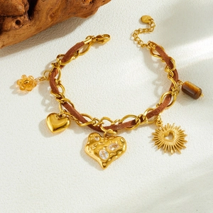 Retro gold plated chain bracelet with heart, flower pendants and tiger eye stone bead