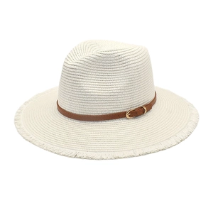 Detail of white straw fedora featuring a brown leather band and frayed edge brim