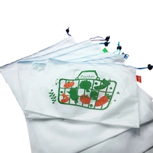 Mesh reusable produce bags with colorful drawstrings and fresh vegetable patterns