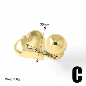 Detailed view of gold heart ring style C with 30mm length and 17mm inner diameter