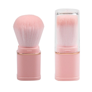 Portable pink powder brush with gradient bristles and transparent dust cover lid