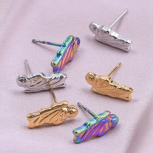 Artistic wrinkled metal stud earrings in gold, silver, and rainbow on pink satin background