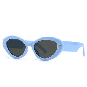 Baroque light blue cat eye sunglasses with gold star rivets and dark grey lenses