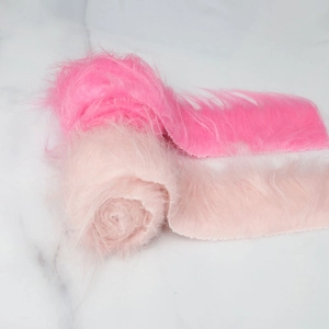 Detail of pink faux fur strips with woven backing for Christmas DIY craft projects