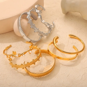 British style vintage titanium steel open bracelets in gold and silver with pearl accents